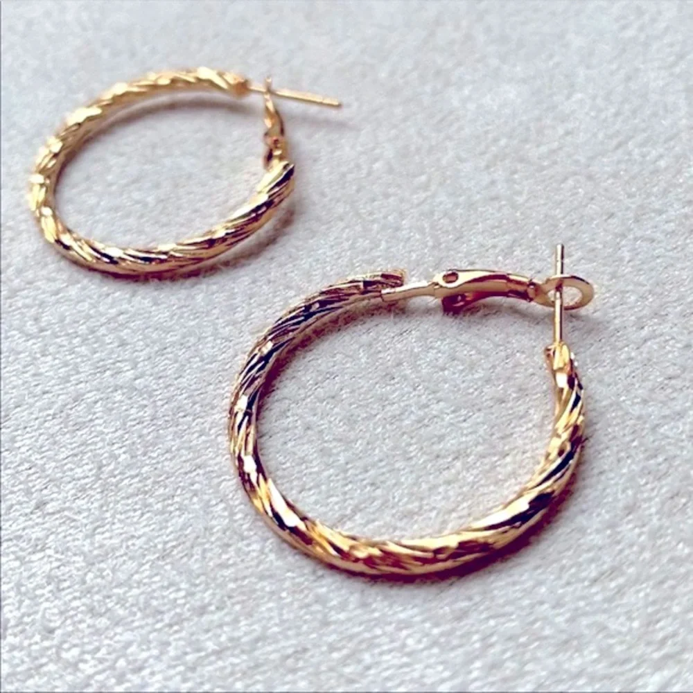 Small textured gold hoop earrings